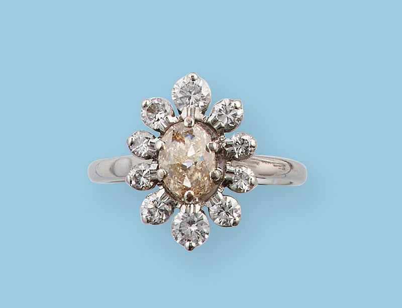 BAGUE type marguerite en or gris (750) ornée...