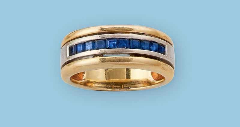 BAGUE JONC en or jaune et gris (750) sertie...