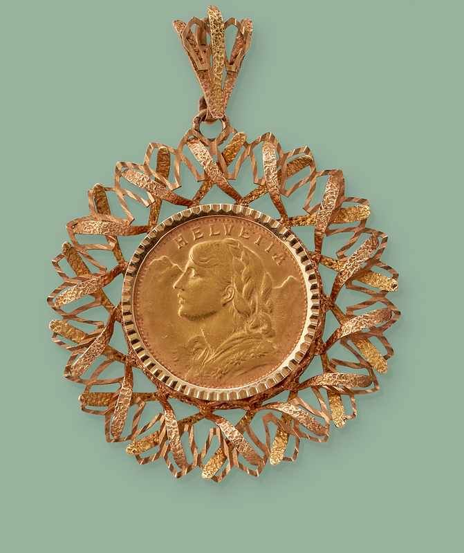 PENDENTIF en or (750) mât et brillant en...