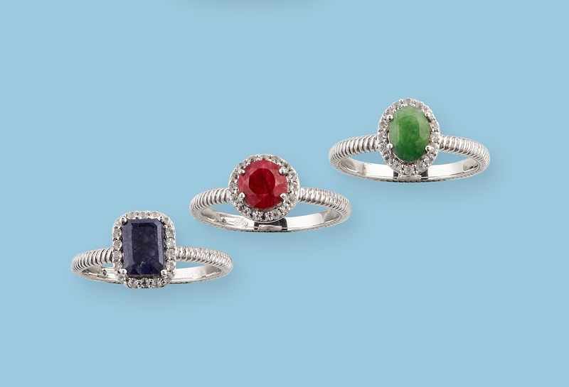TROIS BAGUES en argent (925mm) sertie de...