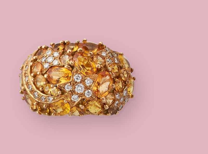 BAGUE en or (750) de forme dôme sertie de...
