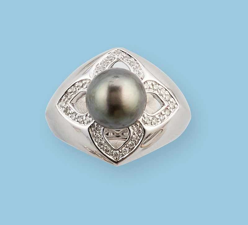 BAGUE en or gris (750) centrée d'une perle...