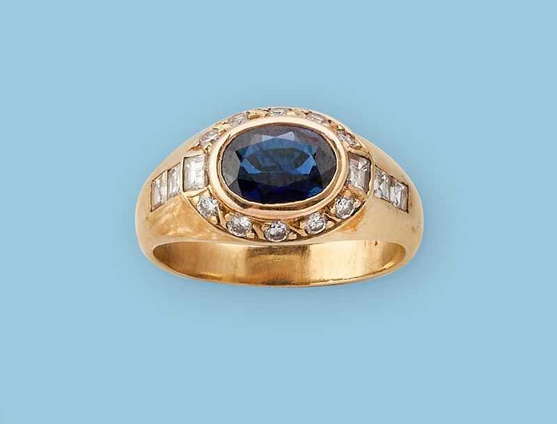 BAGUE en or (750) centrée d'un saphir en...