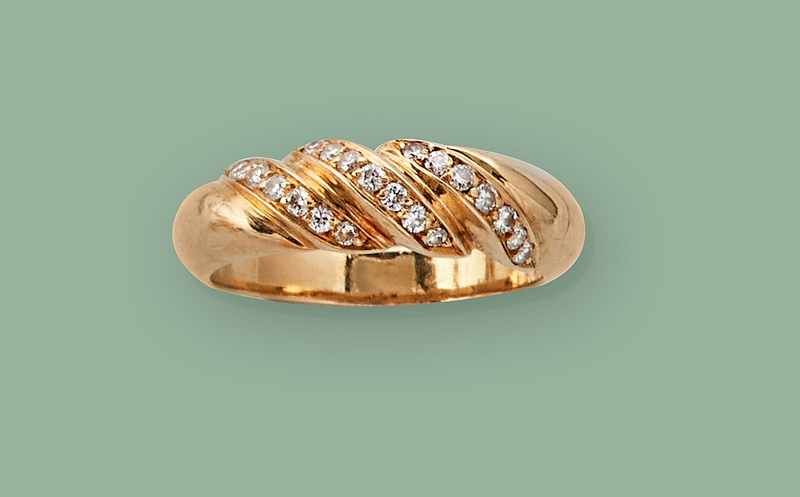 BAGUE torsadée en or 750 et petits diama...