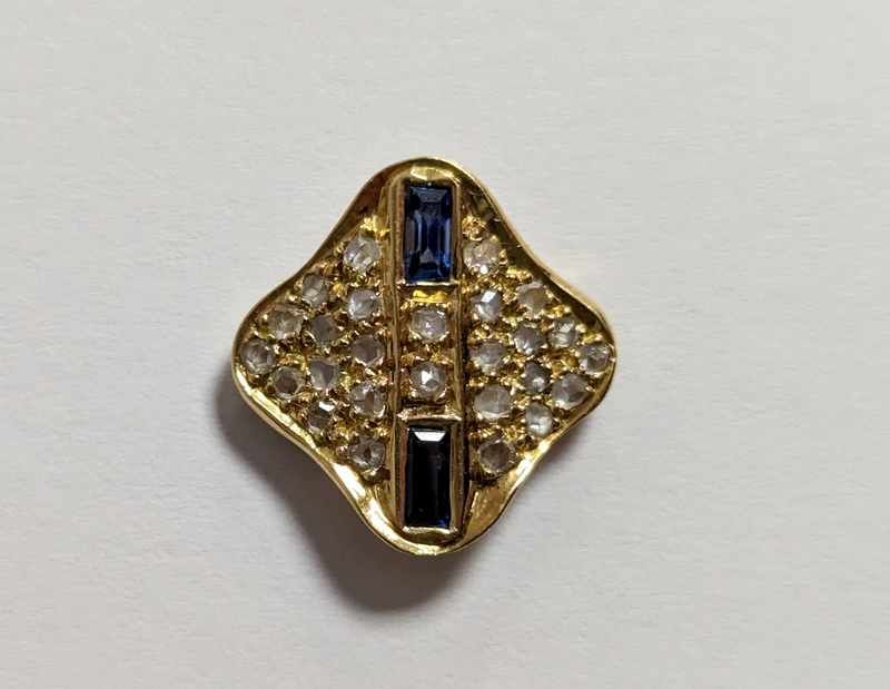 PENDENTIF en or (750) de forme losange serti...