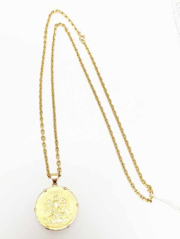 PENDENTIF et CHAÎNE en or (750) orné d'une...