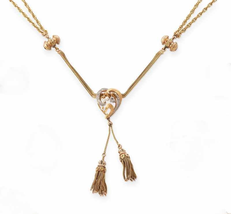 COLLIER sautoir en or deux tons (750) à double...
