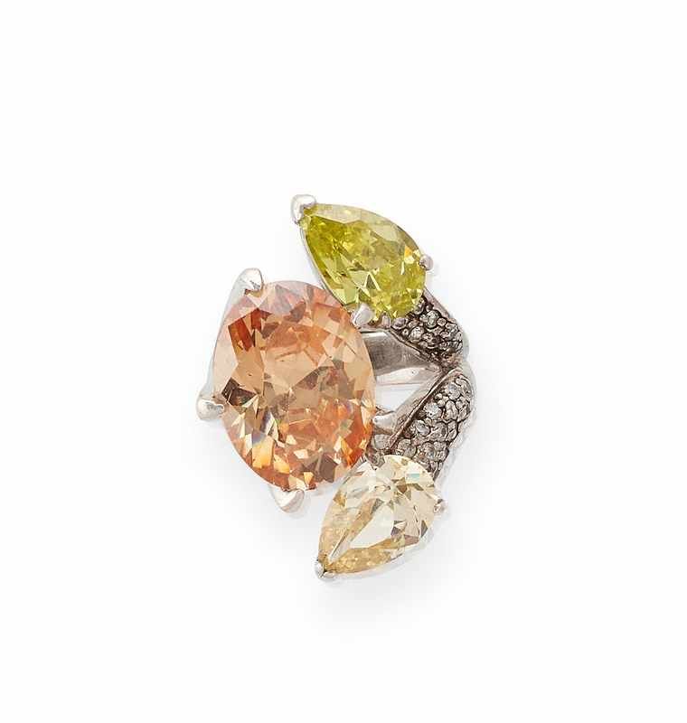 BAGUE en argent (925) sertie de trois pierres...