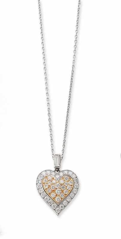 CHAÎNE et PENDENTIF coeur en or gris et jaune...