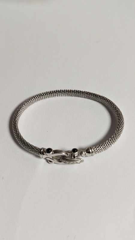 BRACELET en argent (925), fermoir formant...