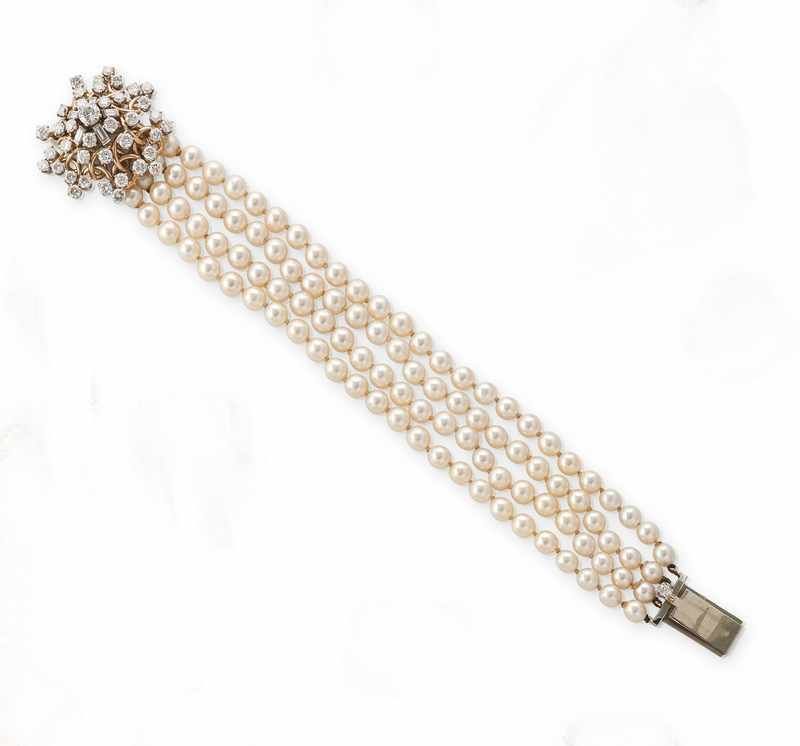 BRACELET de quatre rangs choker de perles...