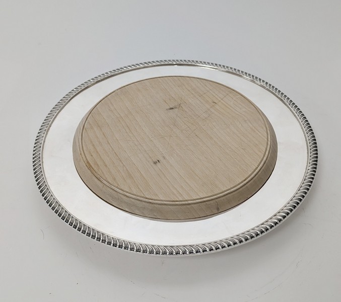 PLAT creux rond en argent à bordure tors...