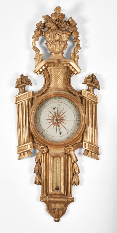 BAROMETRE-THERMOMETRE en bois sculpté et...