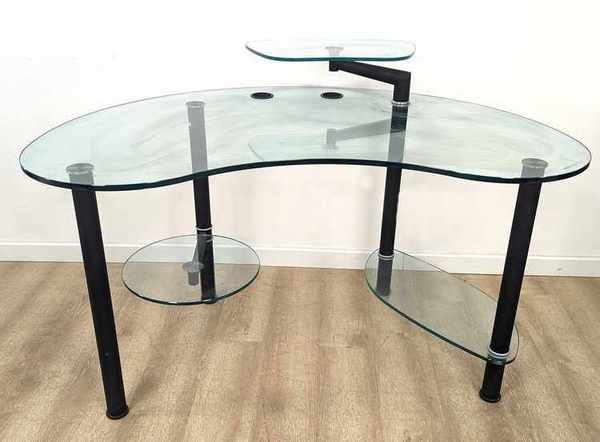 BUREAU à plateau en verre de forme rognon...