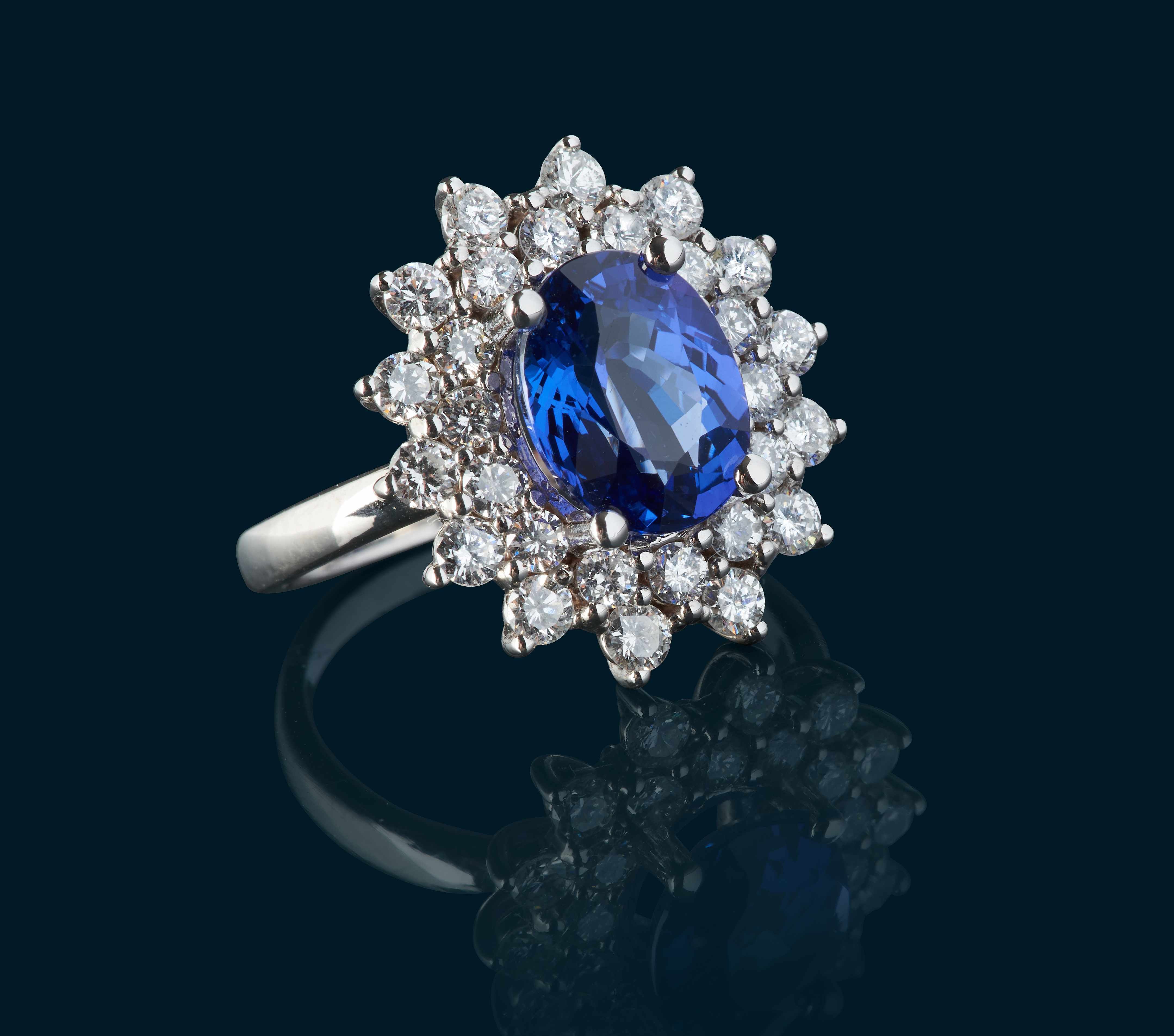 BAGUE type marguerite en or gris (750) ornée...
