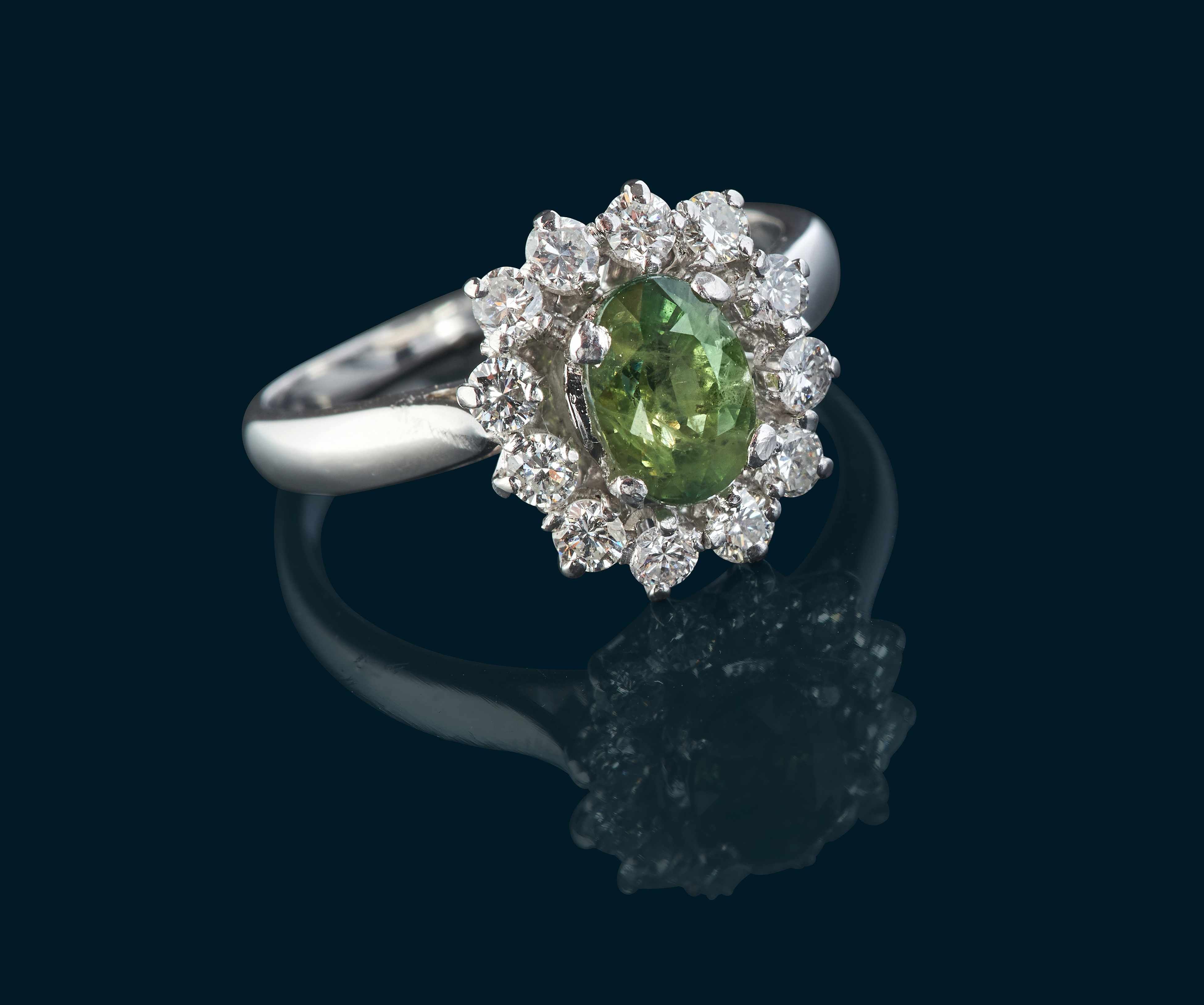 BAGUE marguerite en or gris (750) et platine...