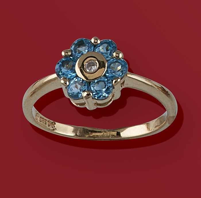 BAGUE fleurs en or jaune (750) avec topazes...