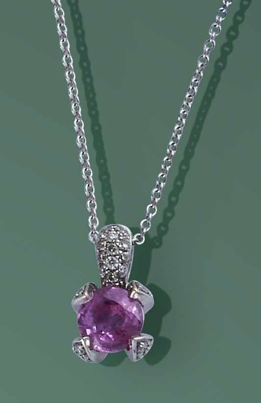 PENDENTIF en or gris (750) avec saphir rose...