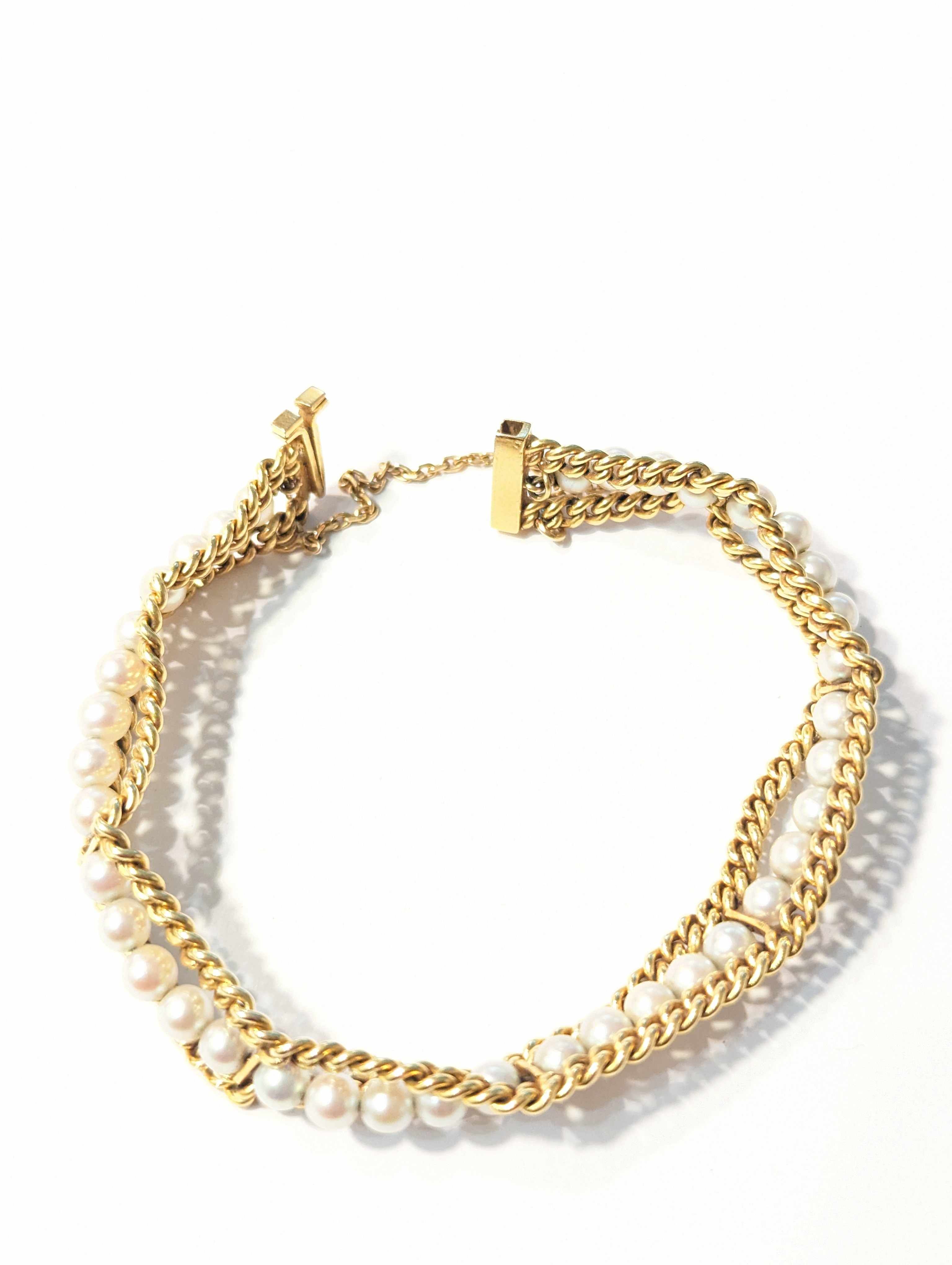 BRACELET en or jaune (750) à double rang...