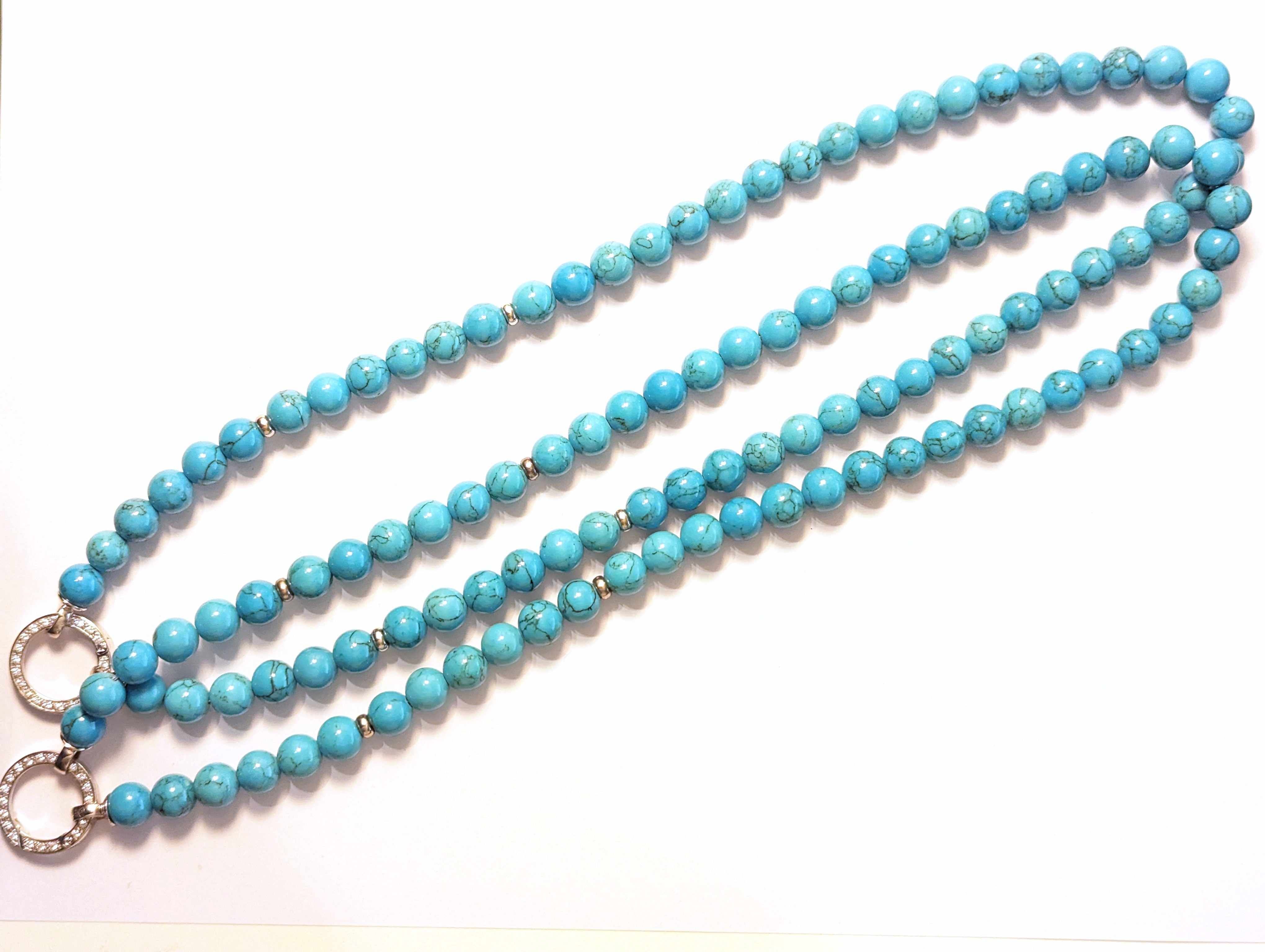 PAIRE DE COLLIERS de perles turquoise, fermoir...