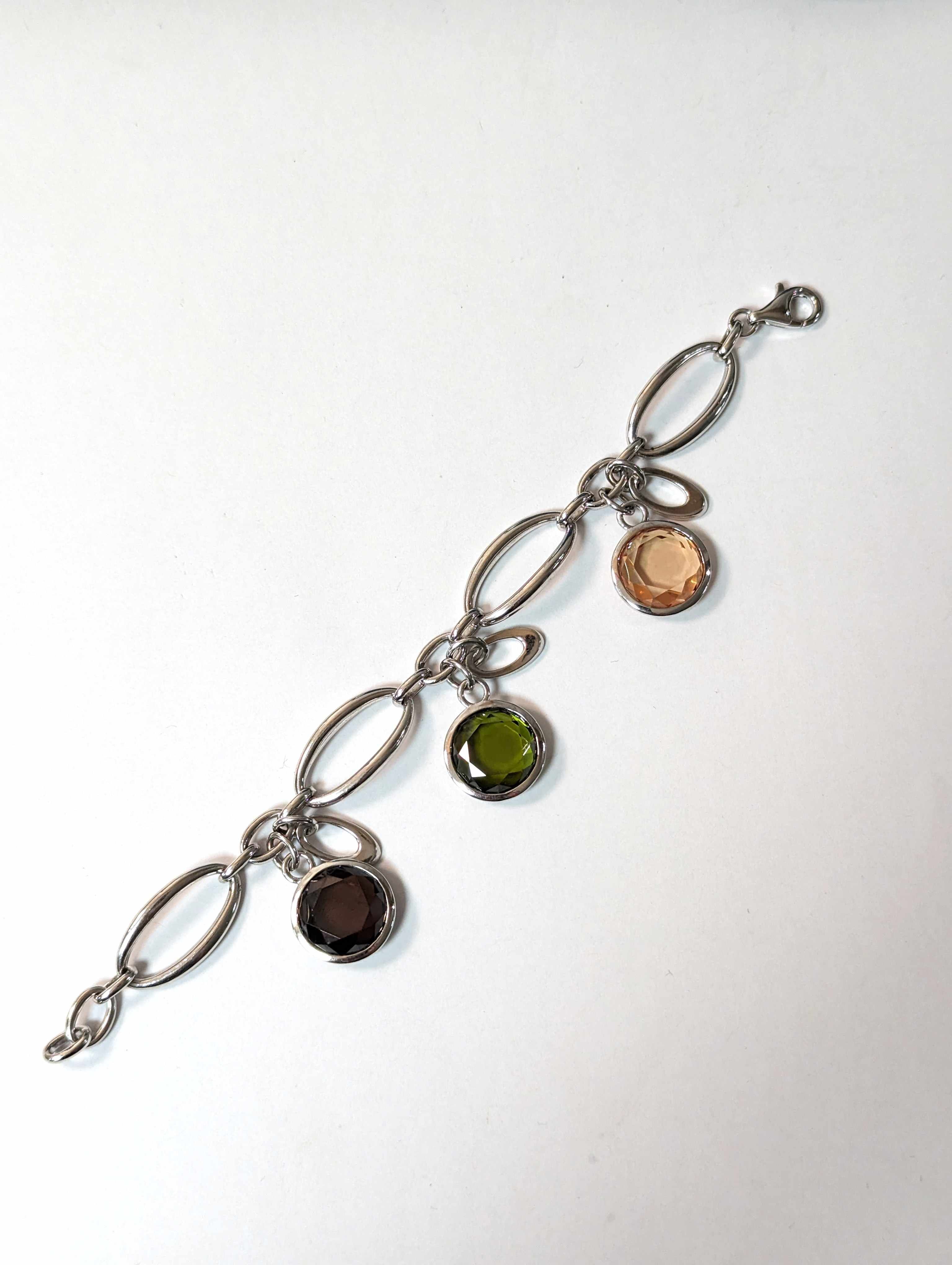 BRACELET en argent (925) sertie de trois...