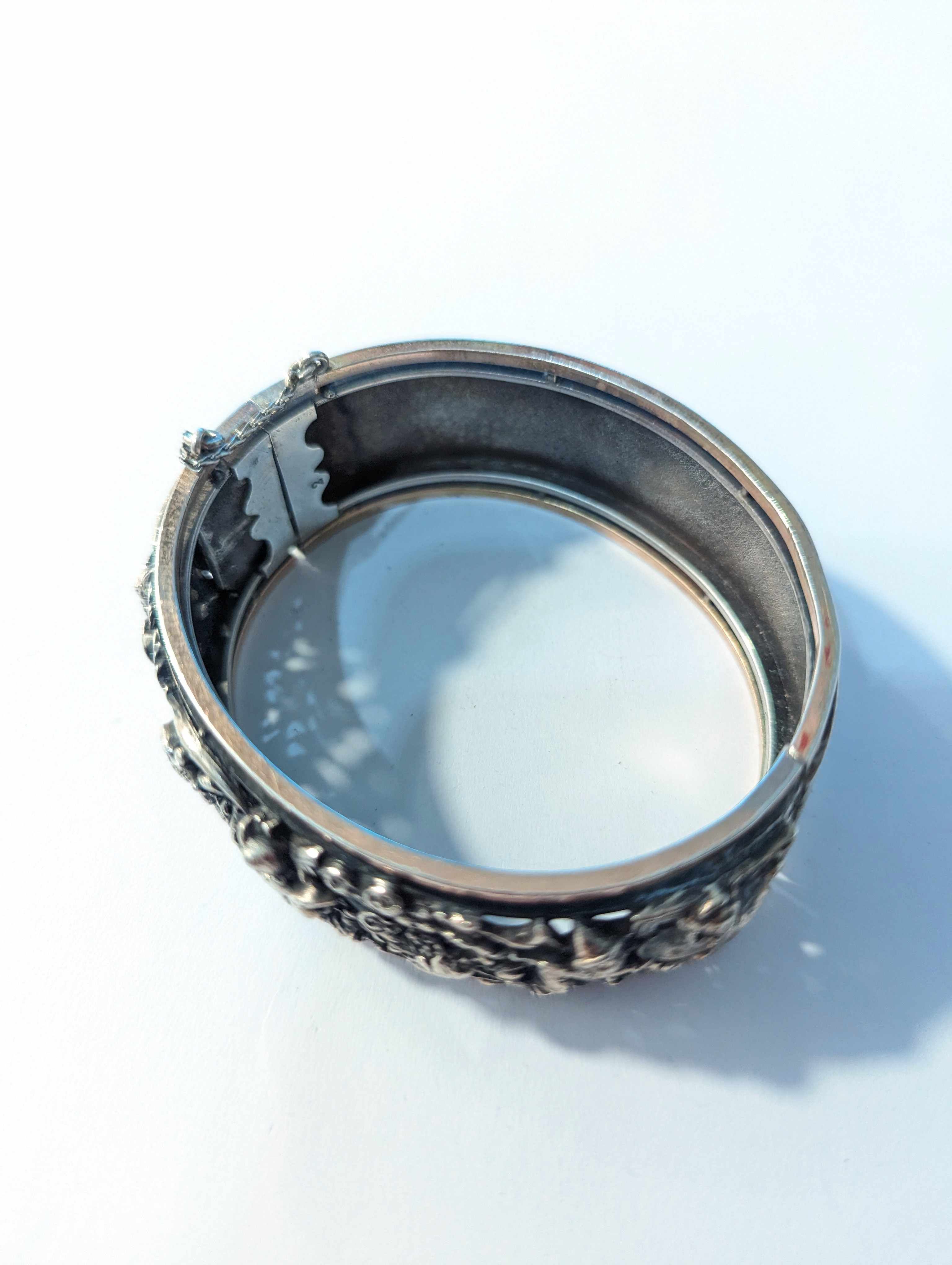 BRACELET JONC articulé, en argent (800) et...