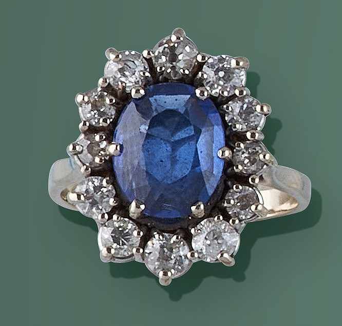 BAGUE marguerite en or gris (750) centrée...