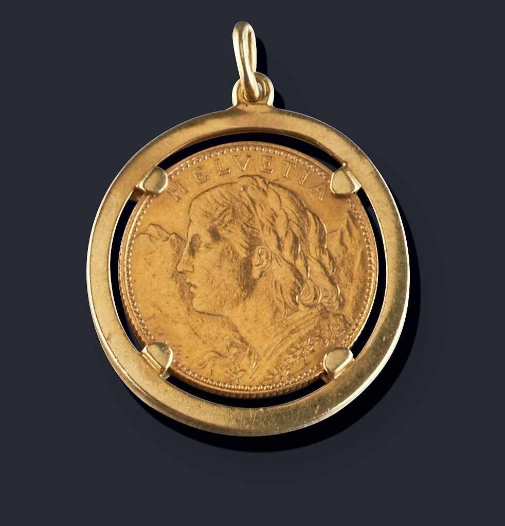 PENDENTIF en or jaune (750) serti d'une pièce...