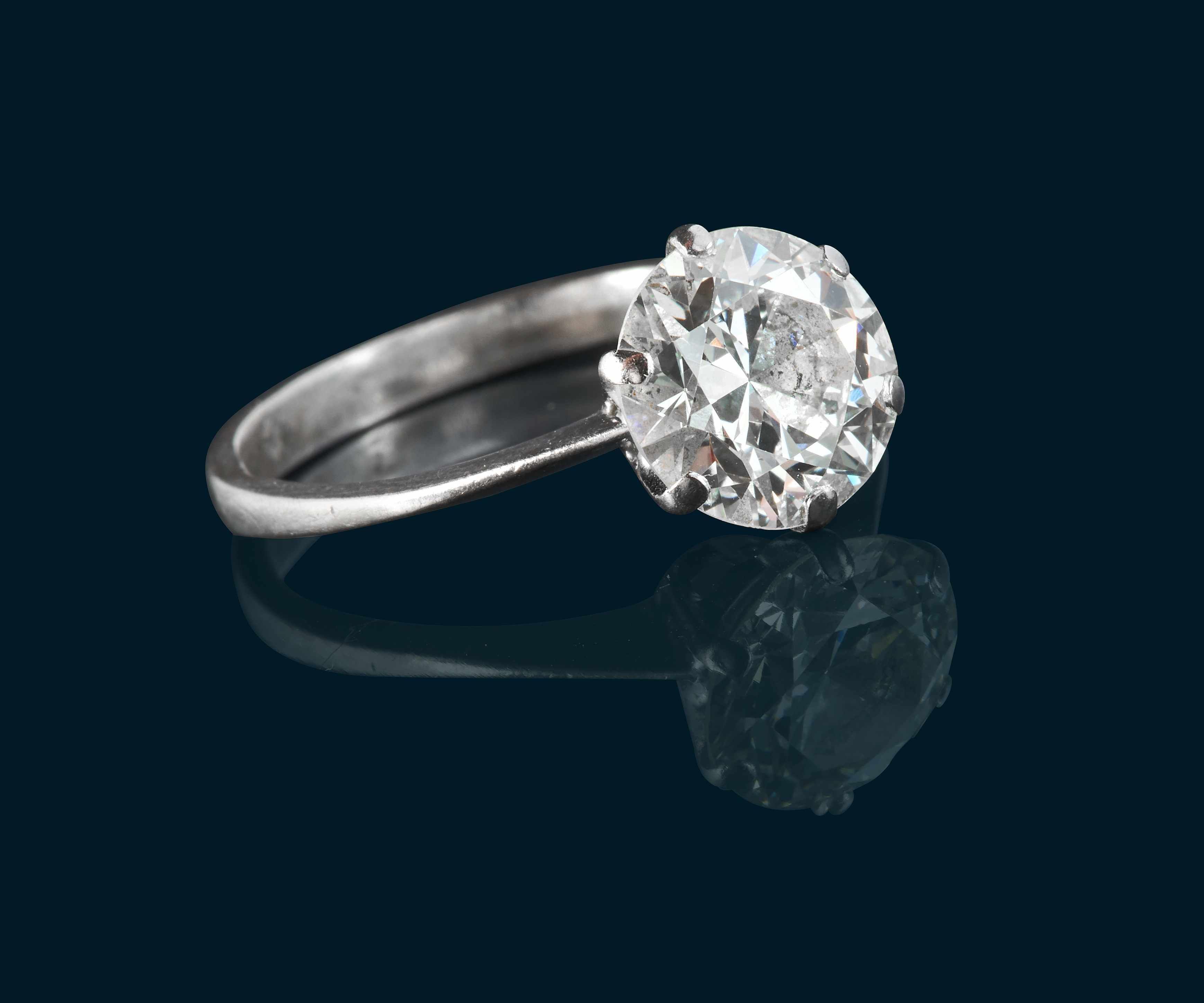 SOLITAIRE en or gris (750) et son diamant...
