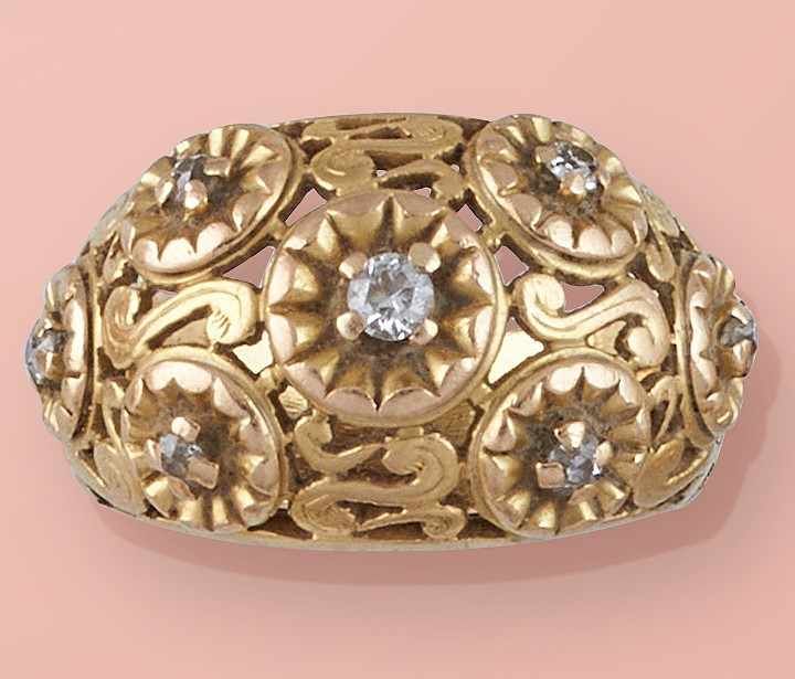 BAGUE jonc en or jaune (750) ajourée à motifs...