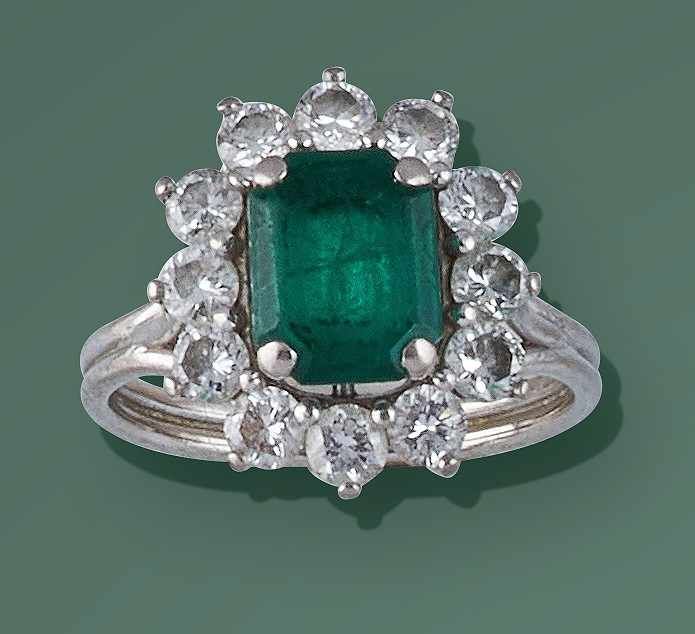 BAGUE marguerite en or gris (750) ornée d'une...