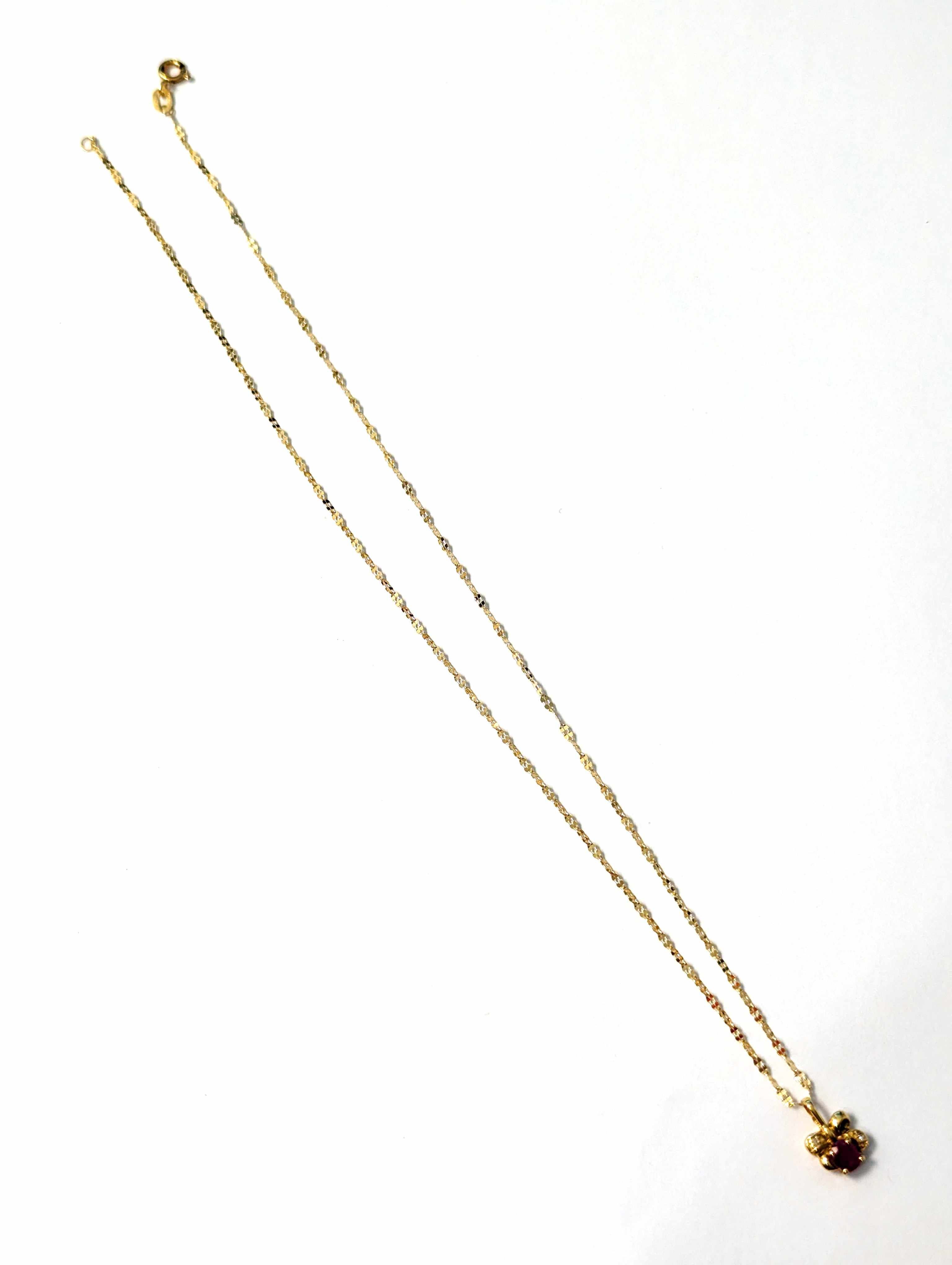 COLLIER CHAINE en or jaune (750) et PENDENTIF...