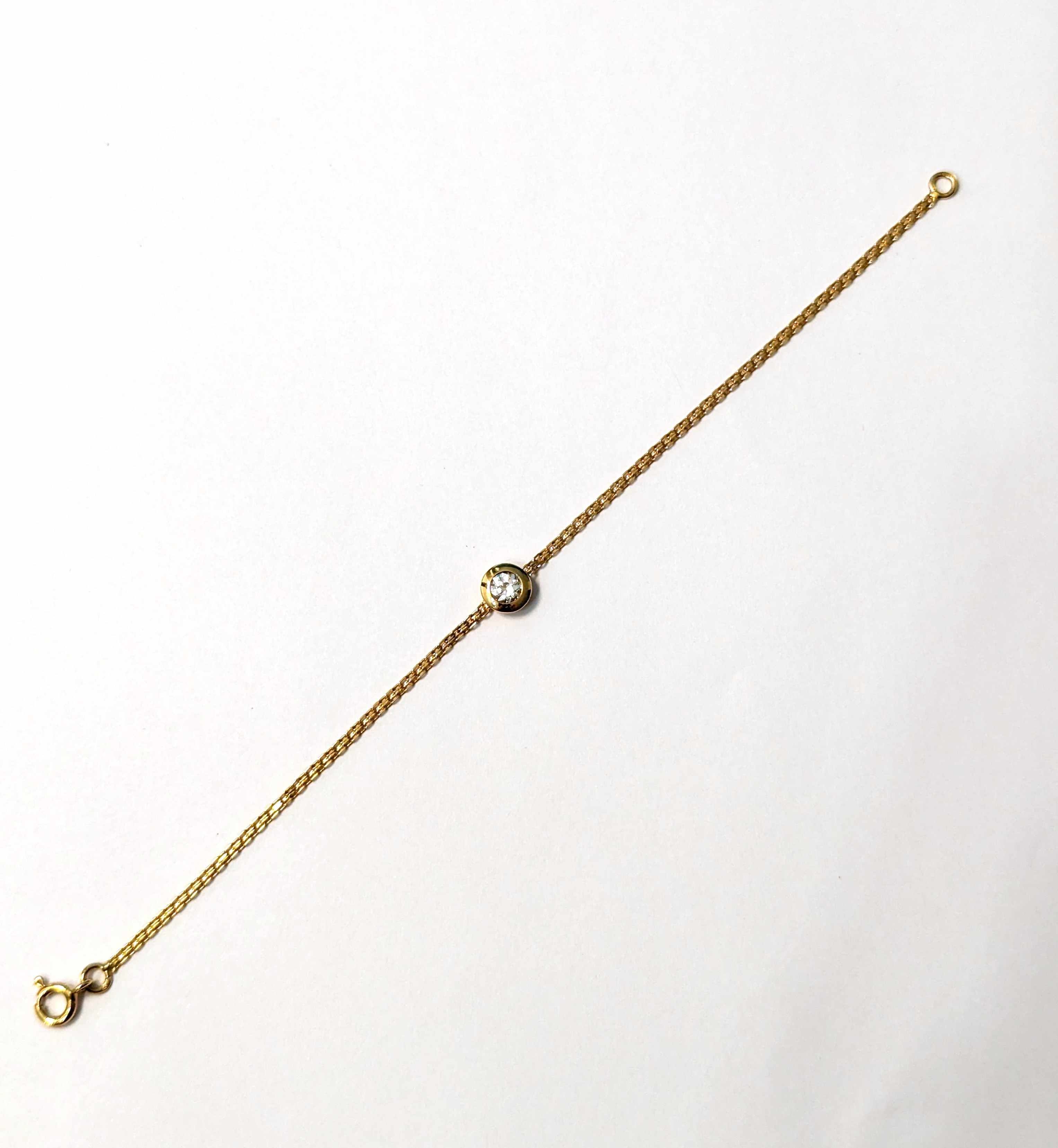 BRACELET en or jaune (750) et motif diamant...
