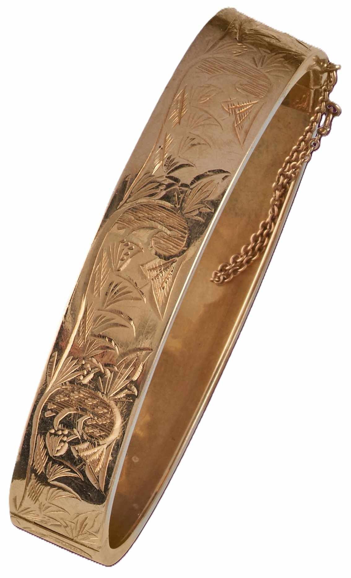BRACELET jonc rigide en or jaune (750) à...