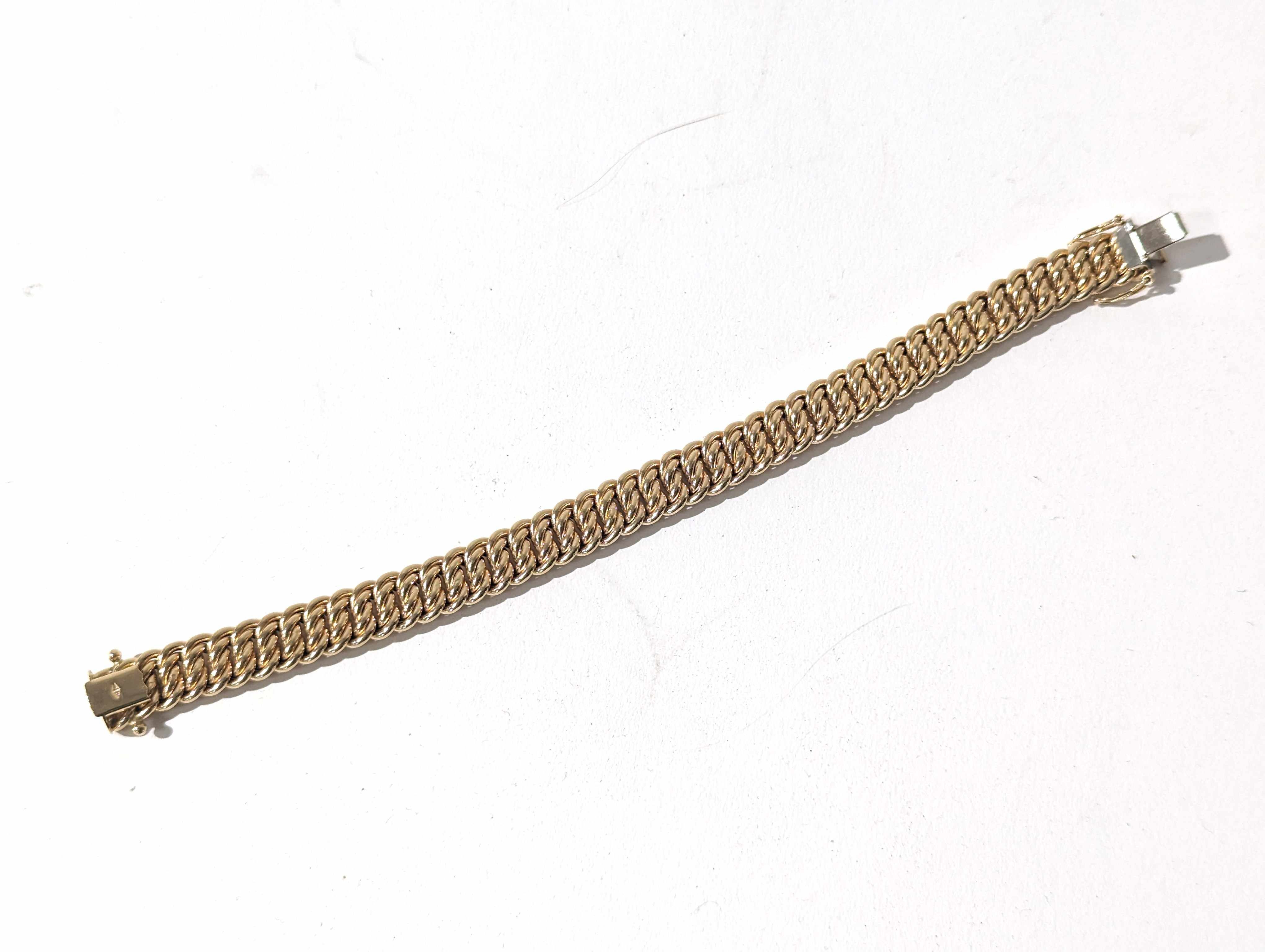 BRACELET en or (750) à mailles américaines...