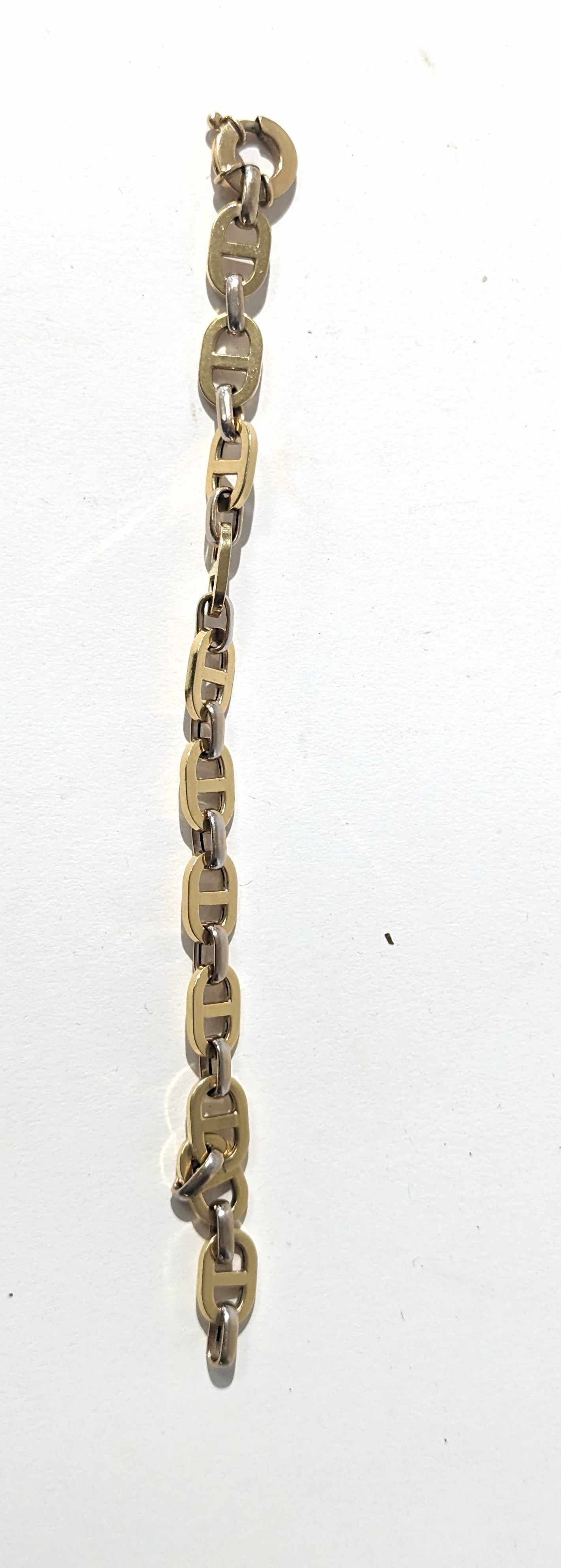 BRACELET en ors jaune et gris (750) à mailles...