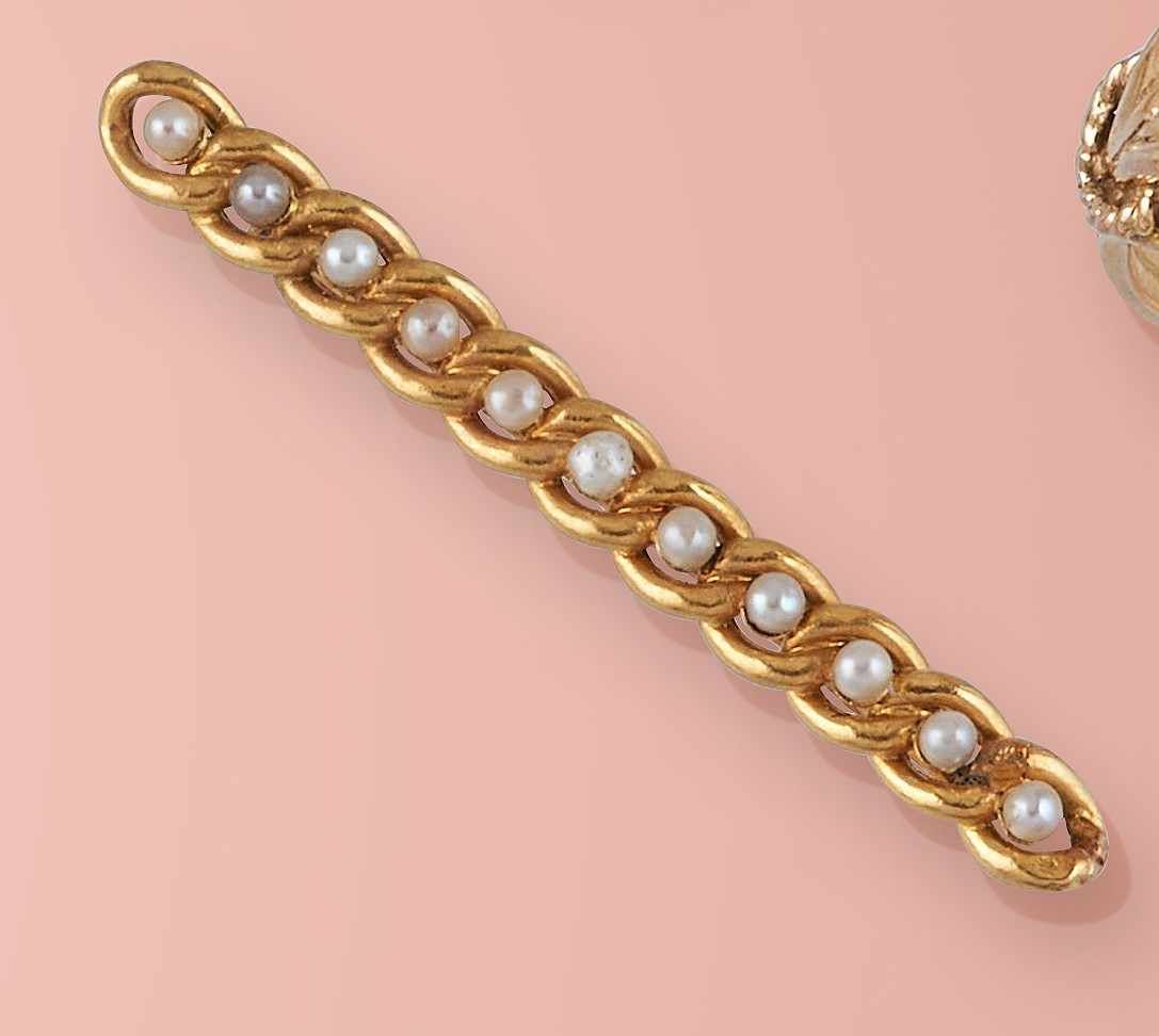 BROCHE BARRETTE en or jaune (750) sertie...