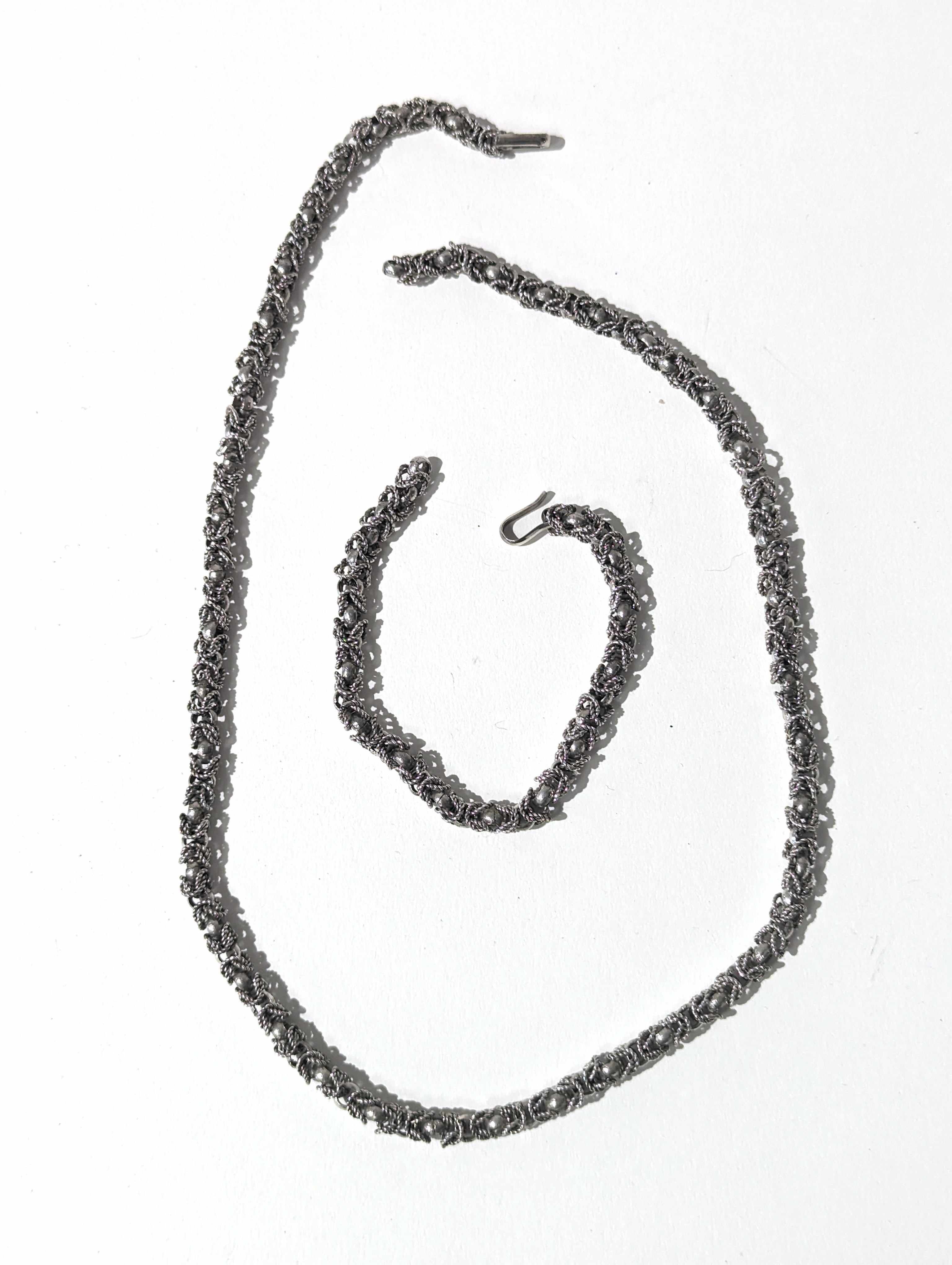PARURE en argent (950) comprenant un collier...