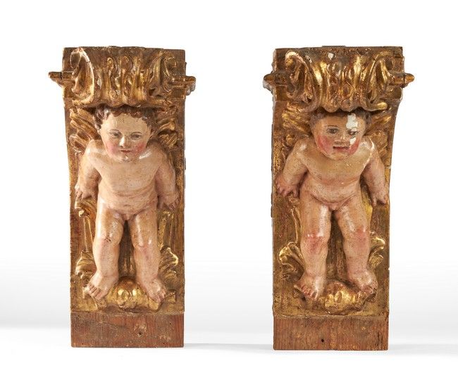 PAIRE DE MONTANTS EN CONSOLE, en bois sculpté...