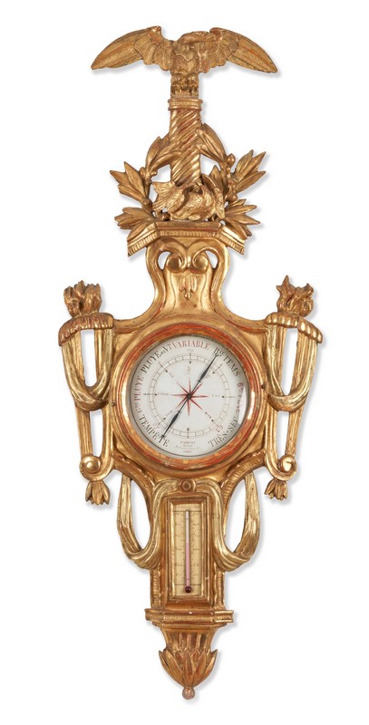 BAROMETRE-THERMOMETRE en bois sculpté et...