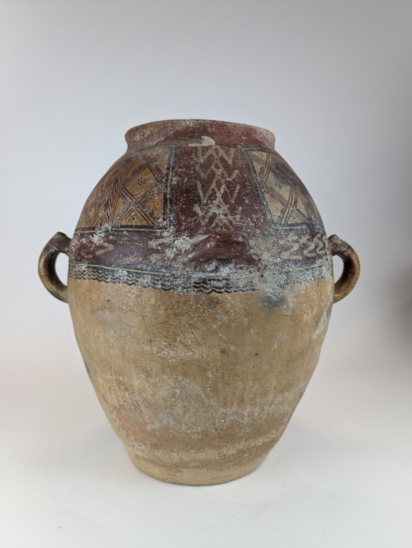 GRAND VASE ovoïde à quatre anses, en terre...