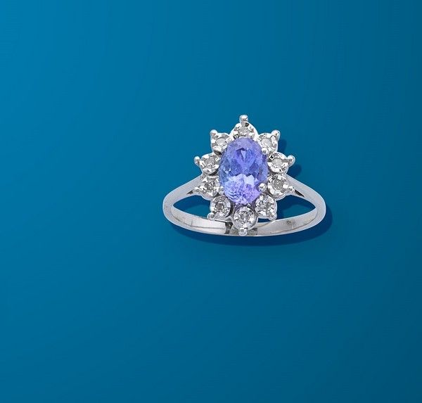 BAGUE marguerite en or gris (750) ornée d'une...