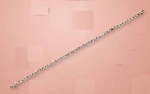 BRACELET ligne, en or gris et jaune (750)...