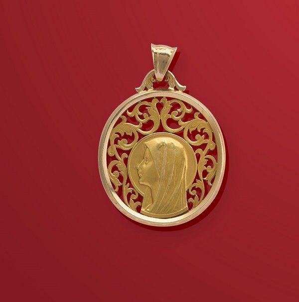 GRANDE MEDAILLE ovale en or (750) à profil...
