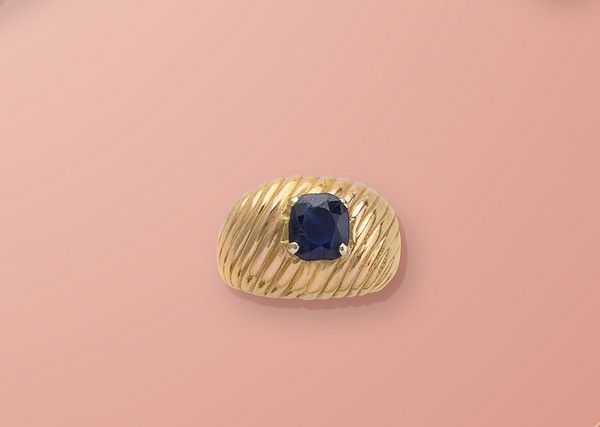 BAGUE jonc torsadée en or (750) ornée d'un...