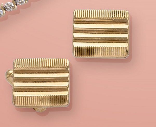 PAIRE DE BOUTONS DE MANCHETTES en or (750)...