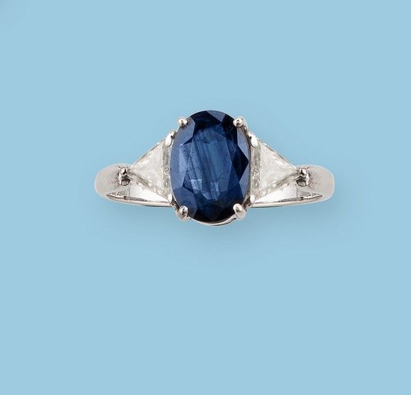BAGUE en or gris (750) centrée d'un saphir...