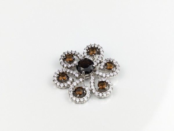 PENDENTIF FLEUR en argent (925) serti de...