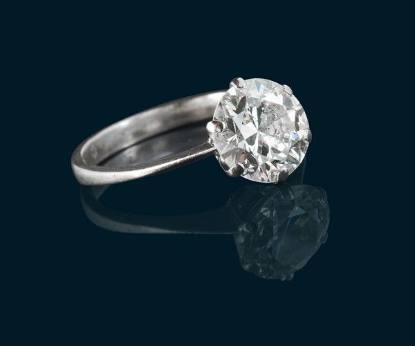 SOLITAIRE en or gris (750) et son diamant...