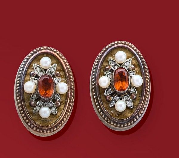 PAIRE DE CLIPS D'OREILLES en or jaune (750)...